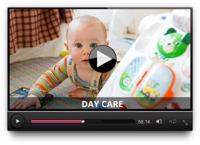 Day care promo video still: a smiling baby playing